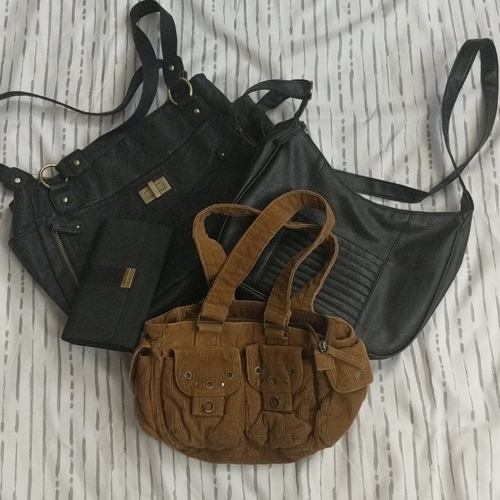 Bundle of used purses and wallet.